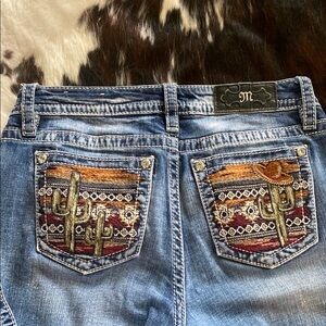 Miss Me embroidered pocket jeans. 29x31